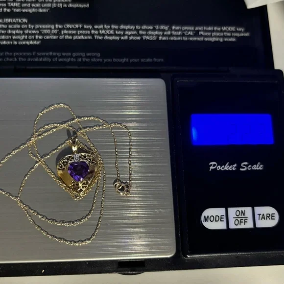 10k gold heart shaped pendant with amethyst stone and small diamond - Picture 3 of 8